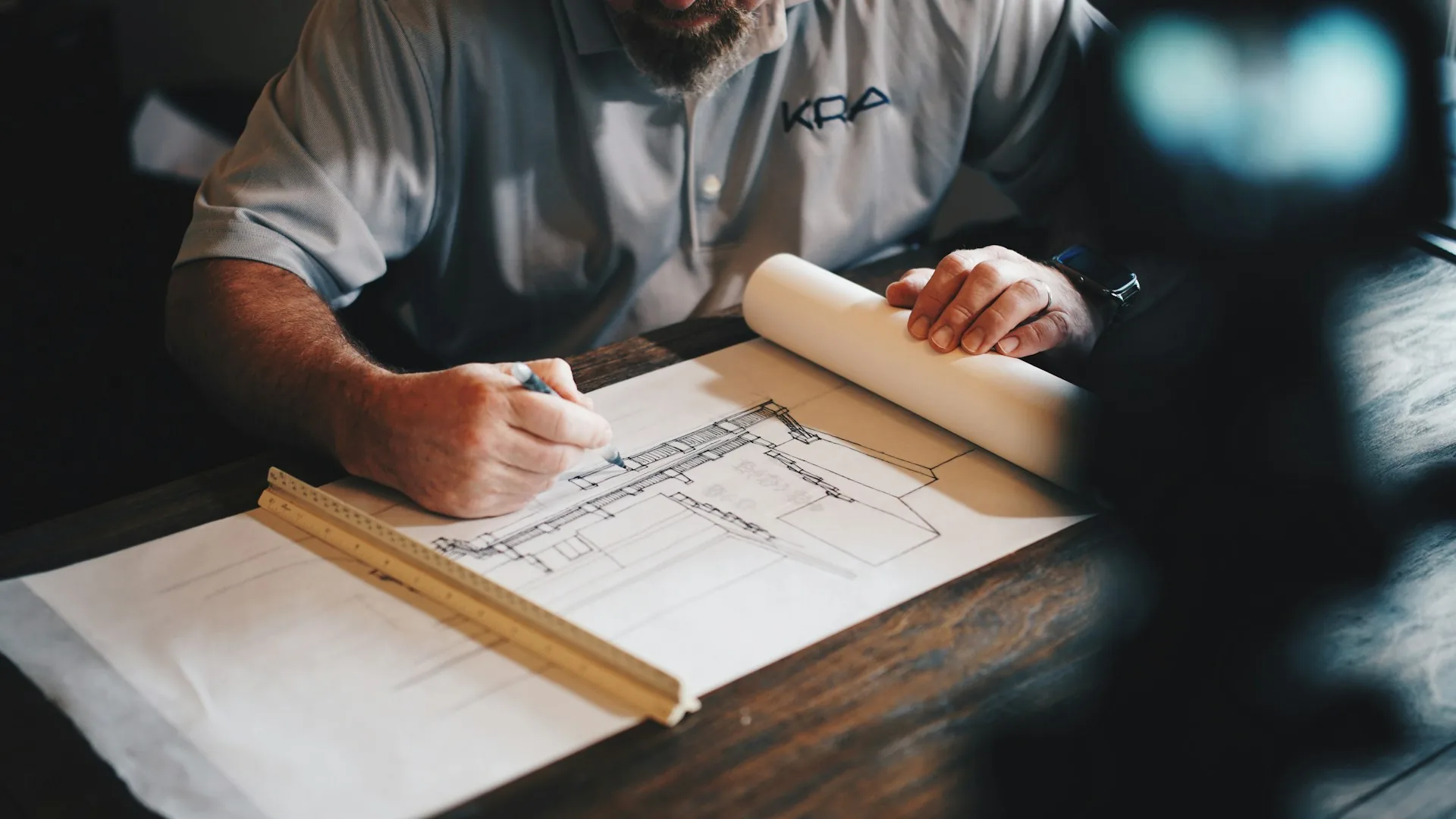 Plans being drafted with a scale ruler